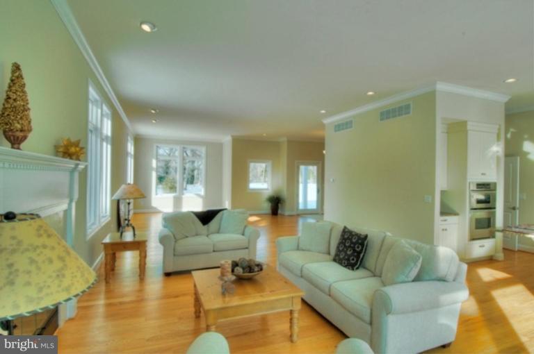 1405 Sharps Point Road Annapolis, MD 21409 - Photo 14 of 14 a living room with furniture and a large window