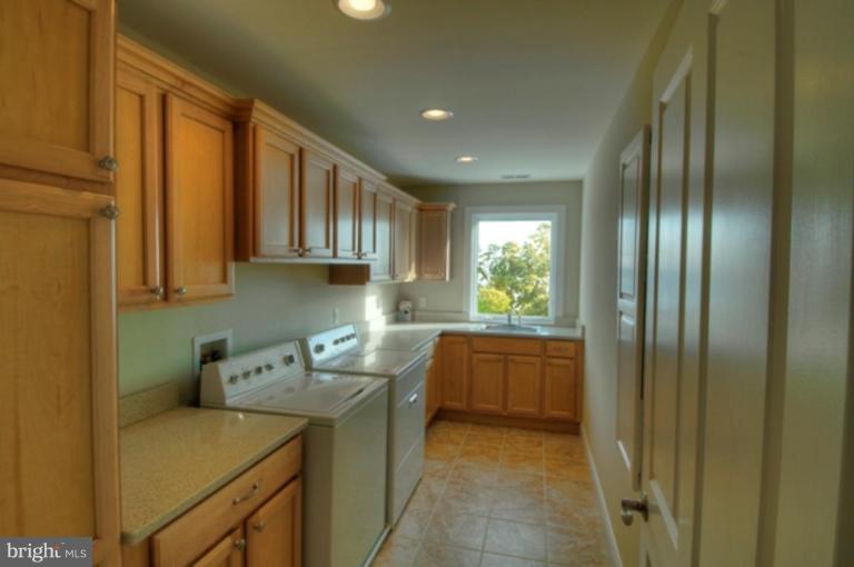 1405 Sharps Point Road Annapolis, MD 21409 - Photo 6 of 14 a room with storage and utility