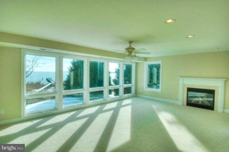 1405 Sharps Point Road Annapolis, MD 21409 - Photo 9 of 14 a view of livingroom with window and ceiling fan