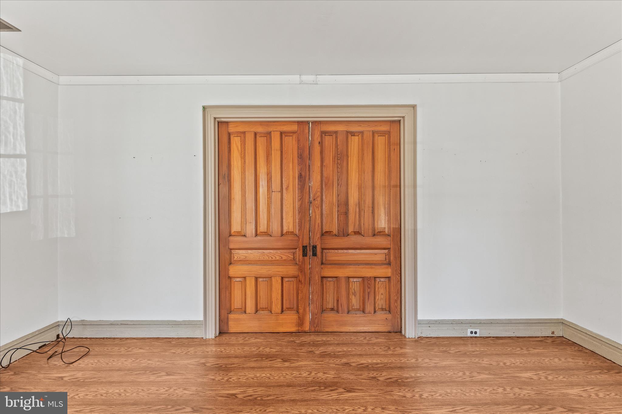 220 Locust Street Hanover, PA 17331 - Photo 8 of 42 Living room with pocket doors closed