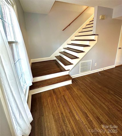 a view of entryway with wooden floor
