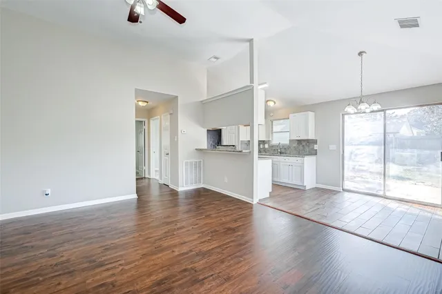 a view of kitchen with wooden floor