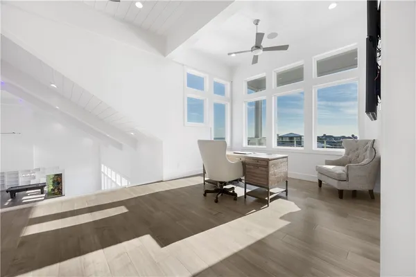 a living room with furniture window and a table