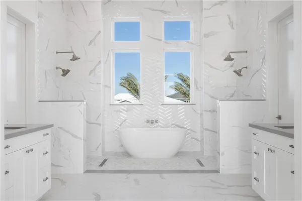 a bathroom with a sink mirror and vanity