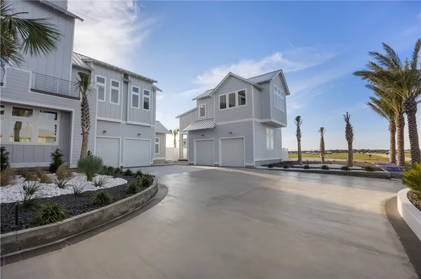 a view of a house with outdoor space and sitting area