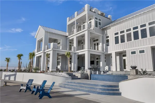 a view of a building with sitting area