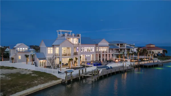 a view of a lake with a house
