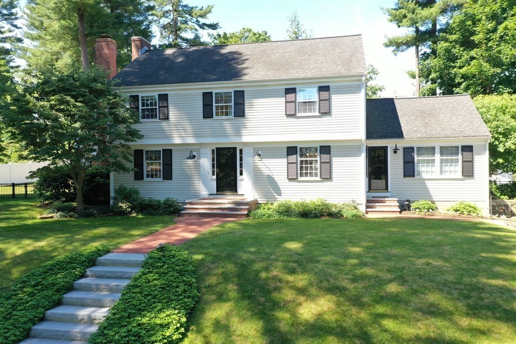 45 Cartwright Road Wellesley, MA 02482 - Photo 1 of 26 front view of a house with a yard