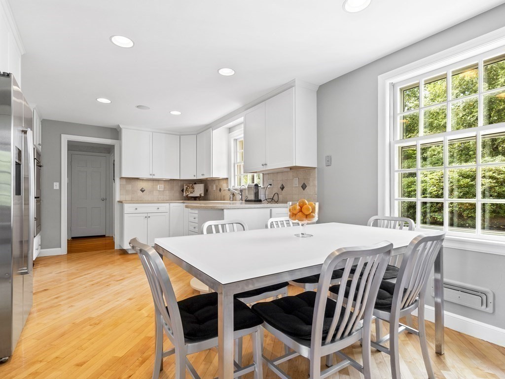 45 Cartwright Road Wellesley, MA 02482 - Photo 11 of 26 a view of a dining room with furniture and a window