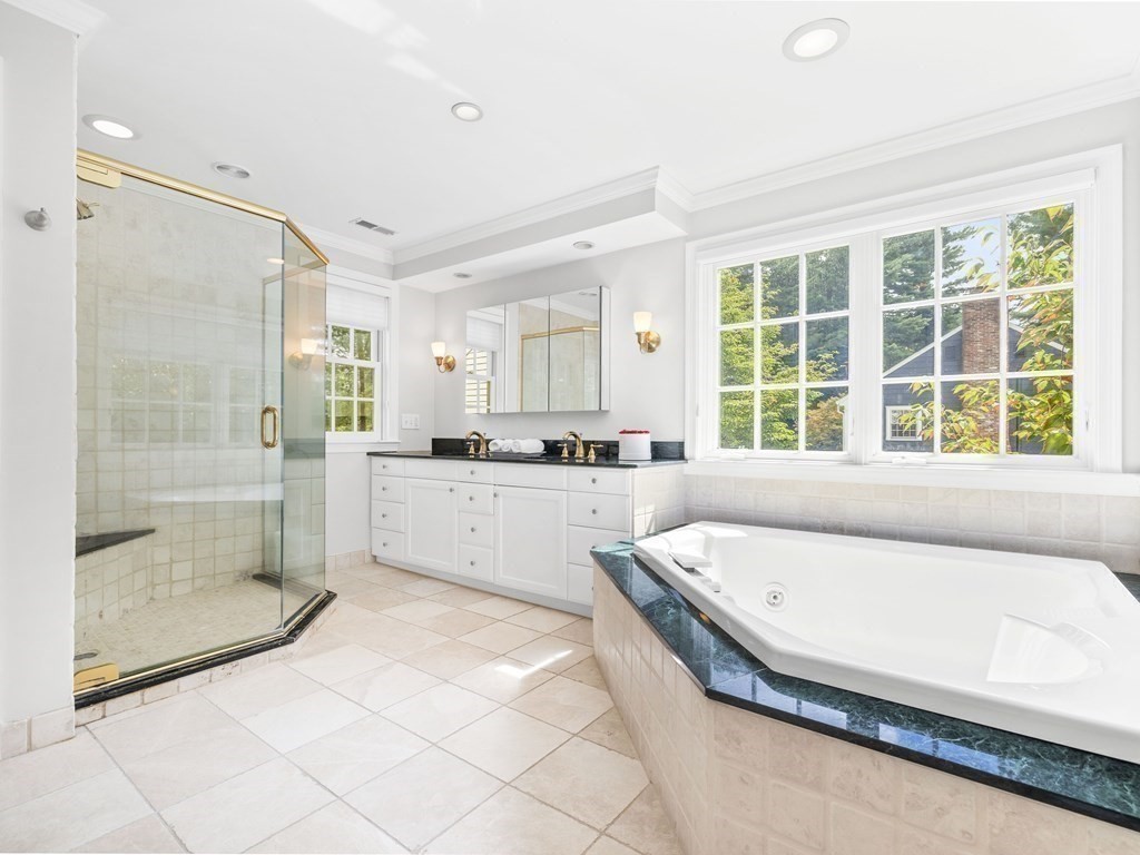 45 Cartwright Road Wellesley, MA 02482 - Photo 14 of 26 a bathroom with a tub shower and sink