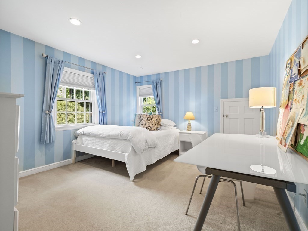 45 Cartwright Road Wellesley, MA 02482 - Photo 15 of 26 a bedroom with a bed and a large window