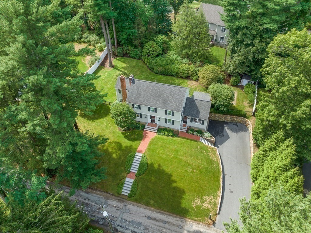45 Cartwright Road Wellesley, MA 02482 - Photo 21 of 26 an aerial view of a house with a yard and pool