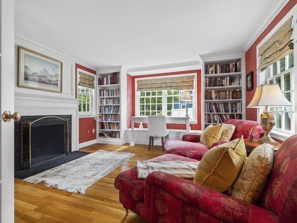 45 Cartwright Road Wellesley, MA 02482 - Photo 6 of 26 a living room with furniture and a fireplace