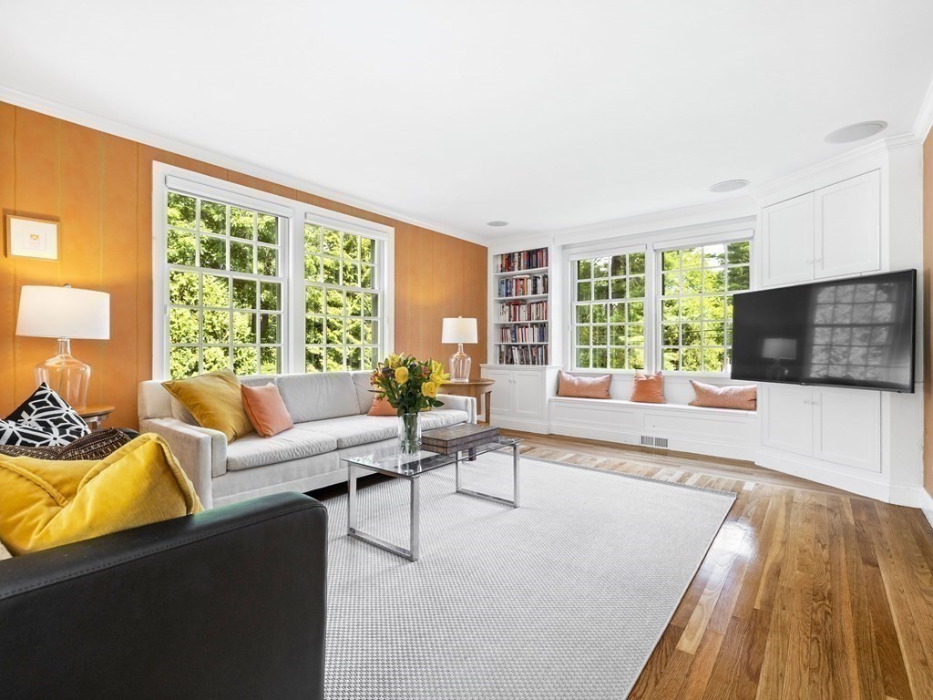 45 Cartwright Road Wellesley, MA 02482 - Photo 8 of 26 a living room with furniture and a flat screen tv