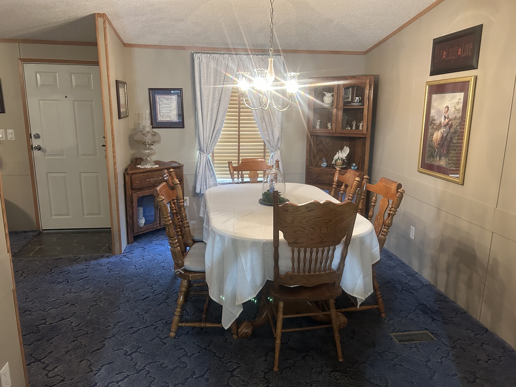 550 Sales Landing Road Camden, TN 38320 - Photo 17 of 27 a view of a dining room with furniture and window
