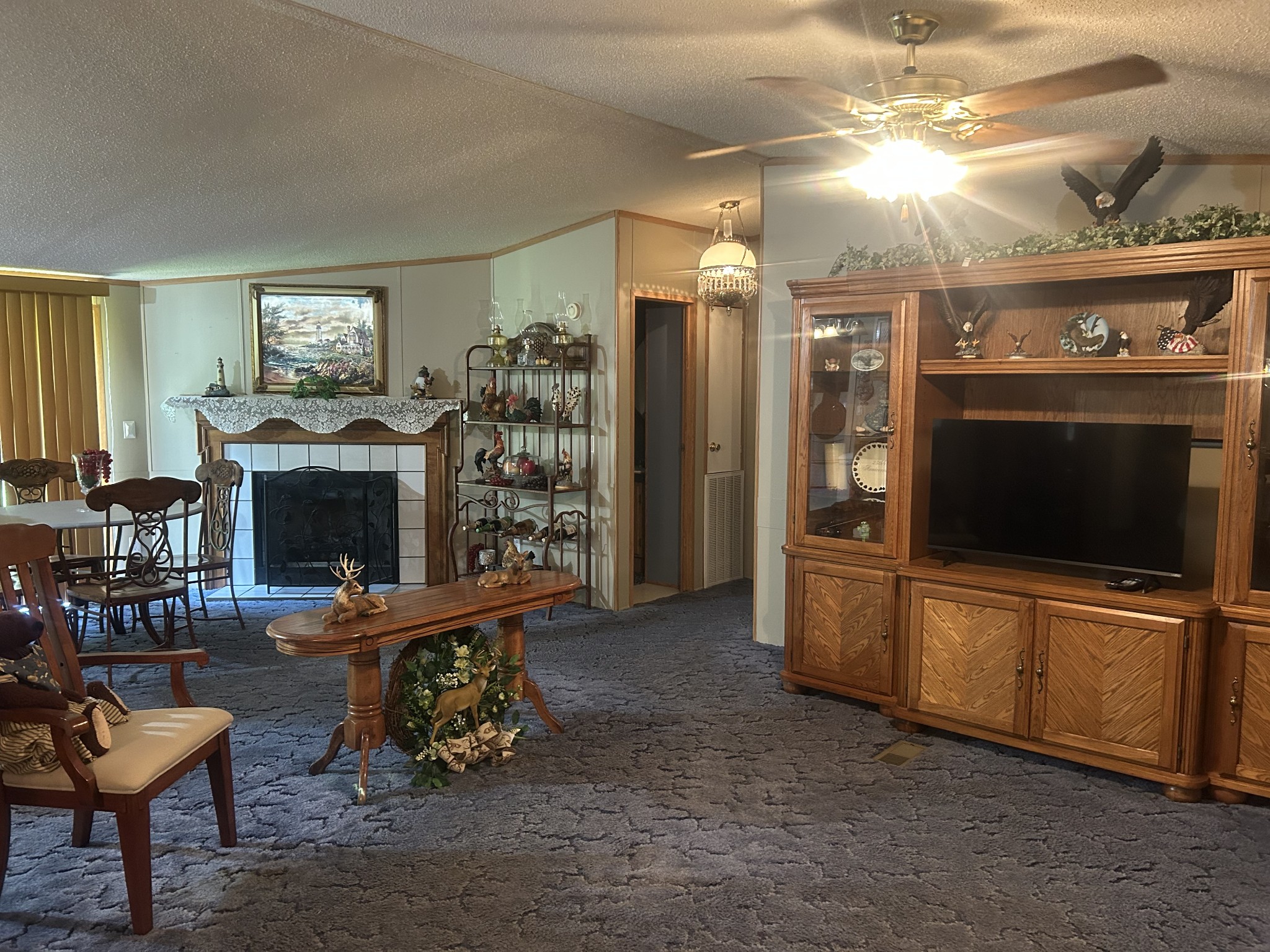 550 Sales Landing Road Camden, TN 38320 - Photo 19 of 27 a living room with furniture and a flat screen tv