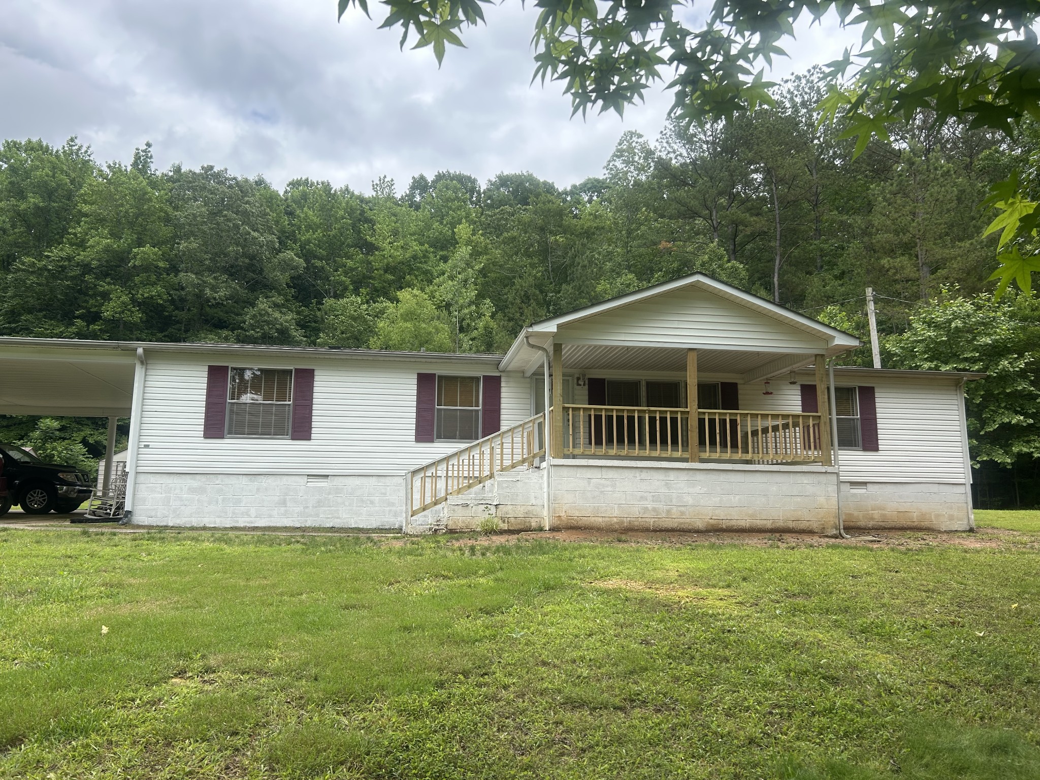 550 Sales Landing Road Camden, TN 38320 - Photo 2 of 27 a front view of house with yard and green space