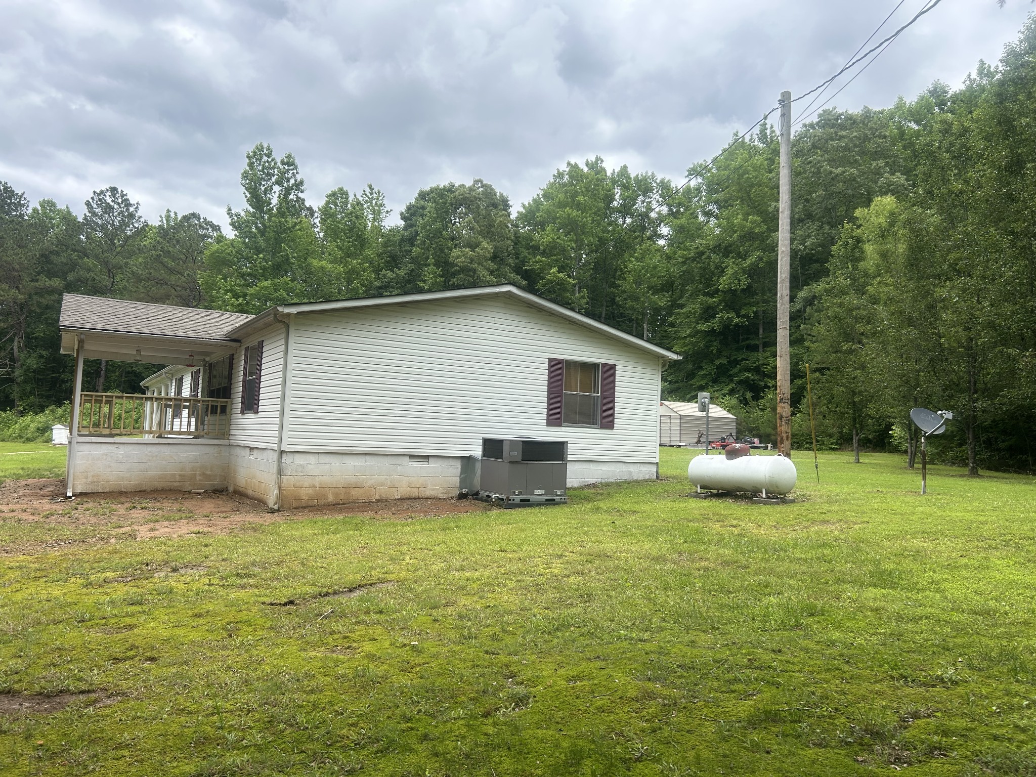 550 Sales Landing Road Camden, TN 38320 - Photo 3 of 27 a view of a house with backyard