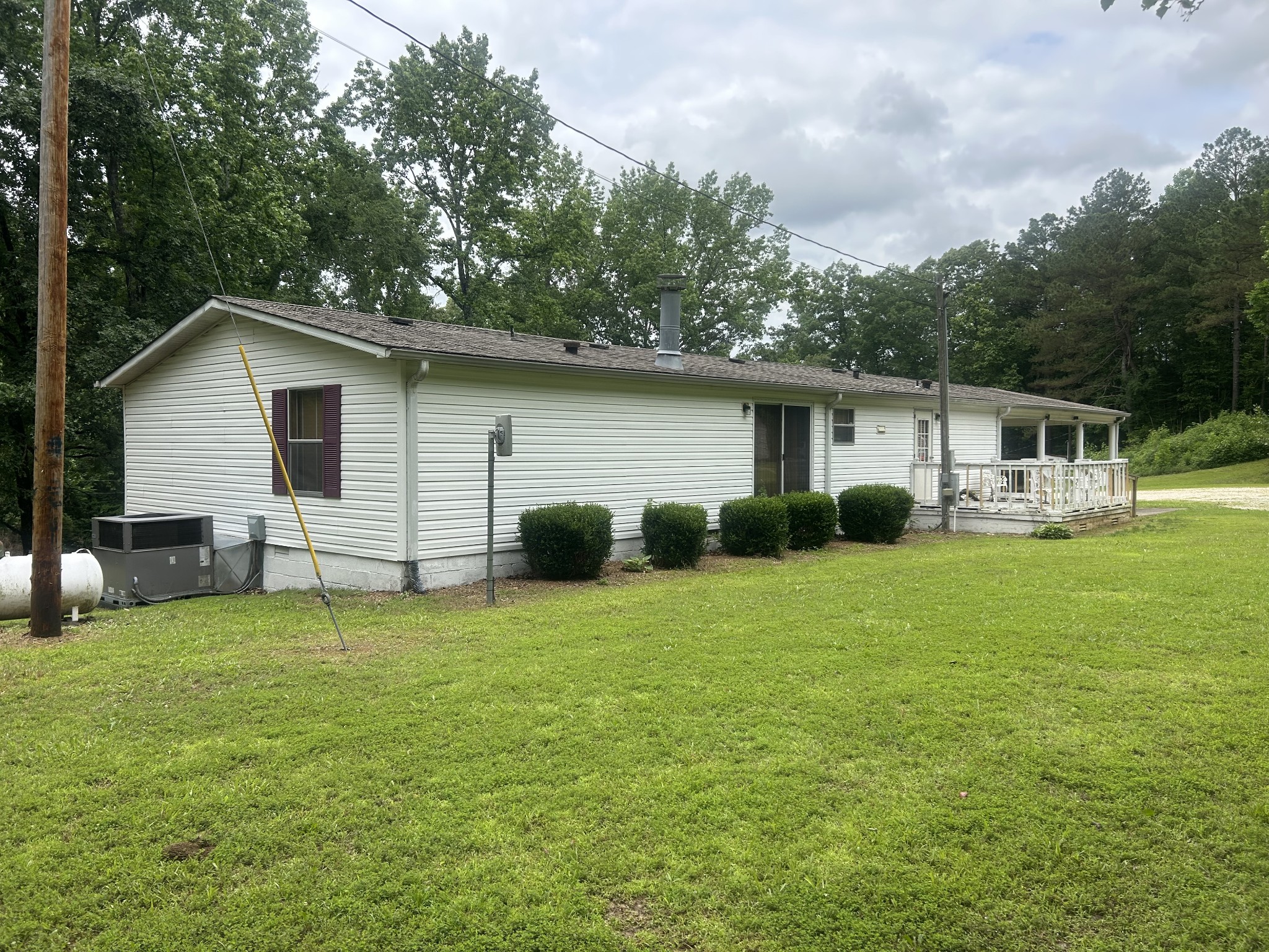 550 Sales Landing Road Camden, TN 38320 - Photo 4 of 27 a house view with a outdoor space