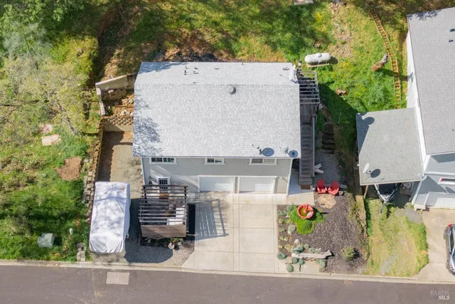 aerial view of a house with outdoor space