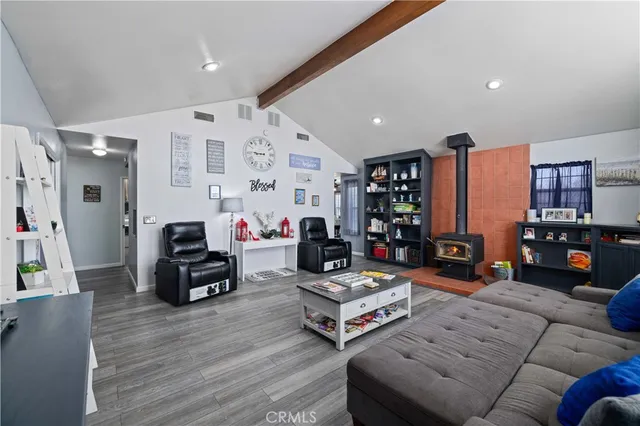 a kitchen with stainless steel appliances granite countertop a stove sink and cabinets