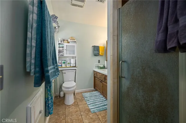 a bathroom with a sink a mirror and a toilet