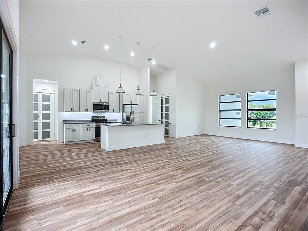 15 Heave Lane Placida, FL 33946 - Photo 16 of 70 a view of kitchen with wooden floor and electronic appliances