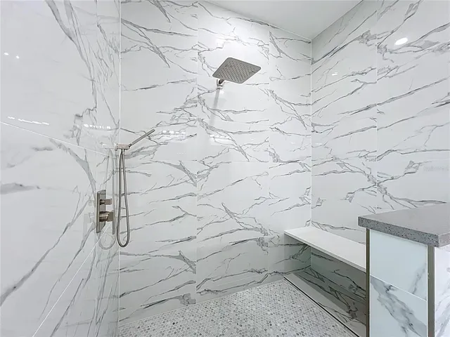 a view of a sink and a mirror