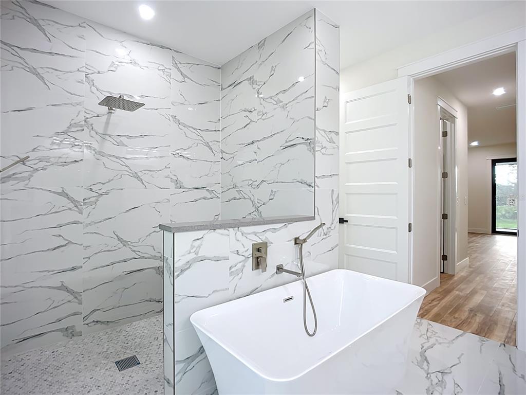 15 Heave Lane Placida, FL 33946 - Photo 41 of 70 a bathroom with a bathtub and shower