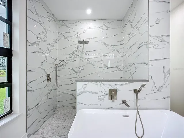 a view of a porch and garden