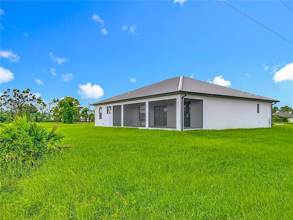 15 Heave Lane Placida, FL 33946 - Photo 62 of 70 a view of a house with a backyard