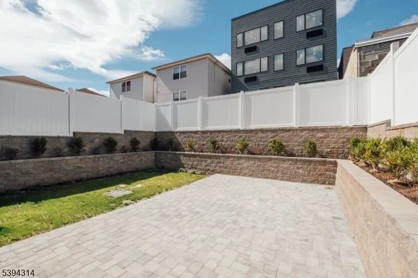 a view of a back yard of the house