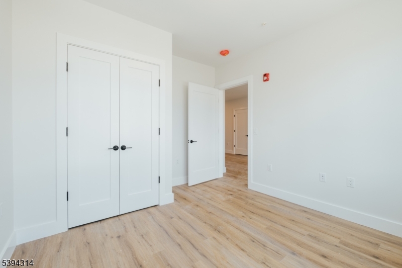 67 Summer Avenue, Unit 101 Newark, NJ 07104 - Photo 7 of 26 a view of an empty room