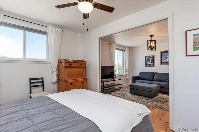 a bedroom with a bed and furniture