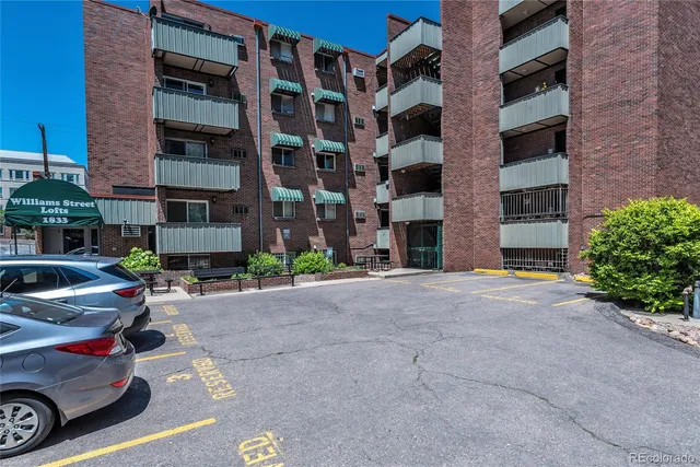 a car parked in front of a building