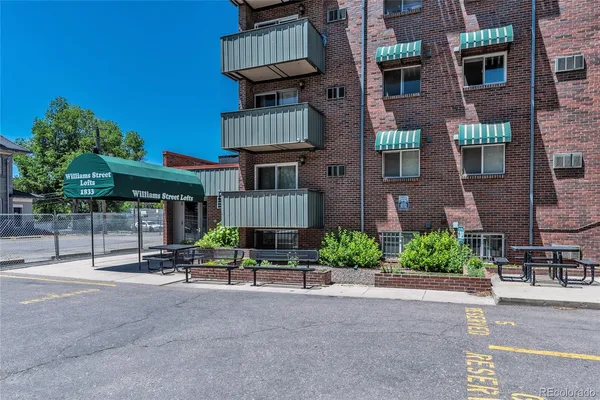 a view of pool with outdoor seating