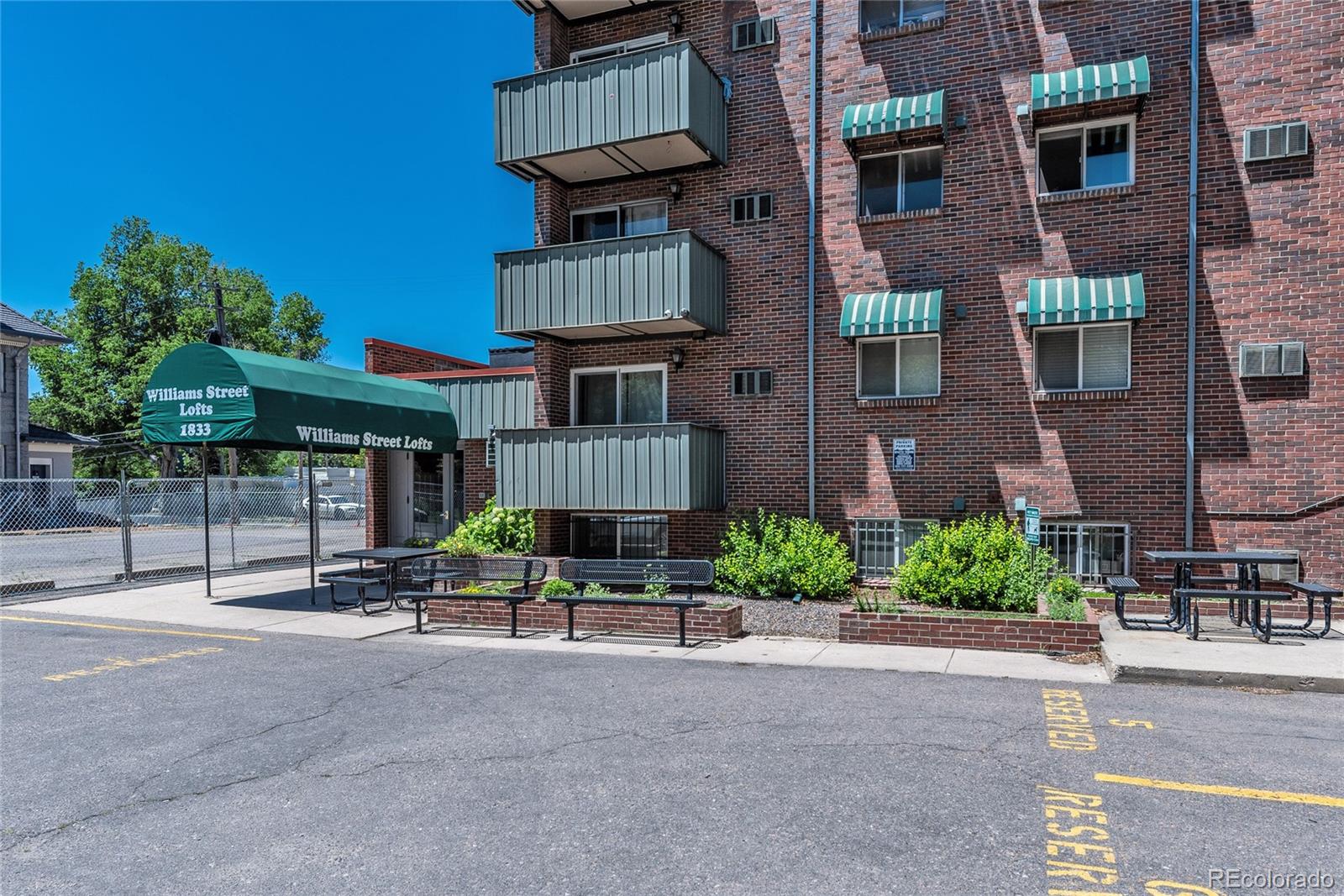 1833 North Williams Street, Unit 504 Denver, CO 80218 - Photo 17 of 19 a view of pool with outdoor seating