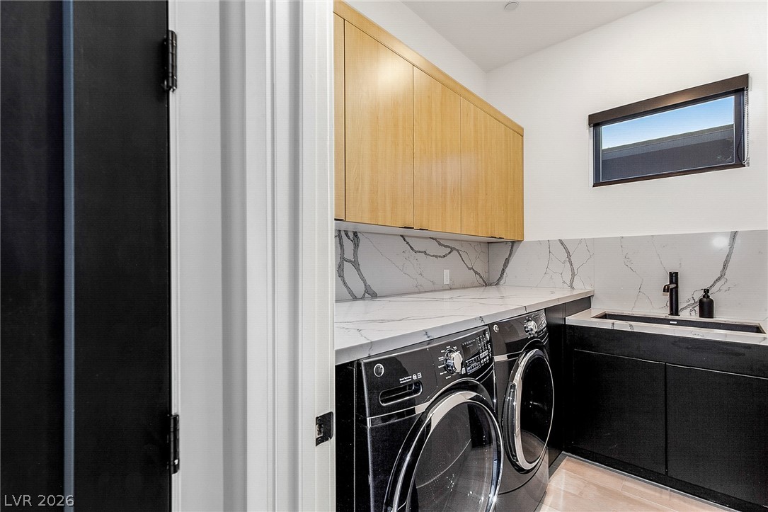 2240 Sky Pointe Ridge Drive Henderson, NV 89052 - Photo 55 of 63 Laundry Room