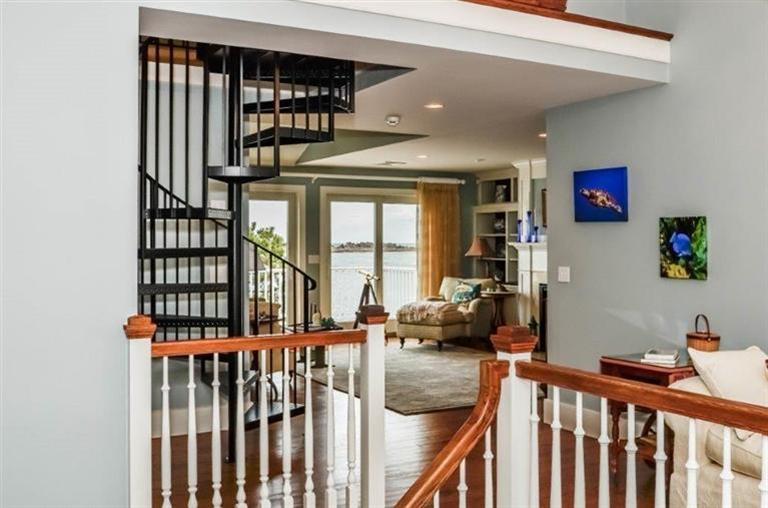 6 Yacht Club Road Falmouth, MA 02536 - Photo 15 of 35 a view of a livingroom with furniture and staircase
