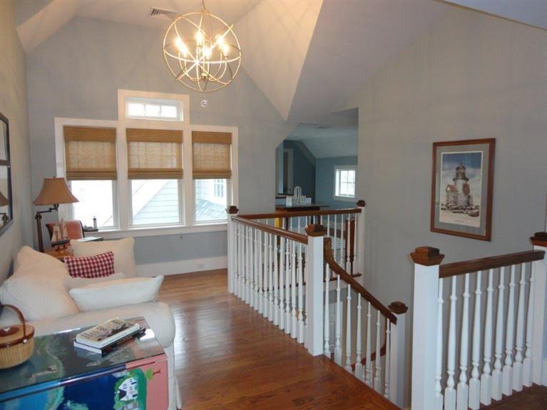 6 Yacht Club Road Falmouth, MA 02536 - Photo 16 of 35 a view of a livingroom with furniture wooden floor chandelier