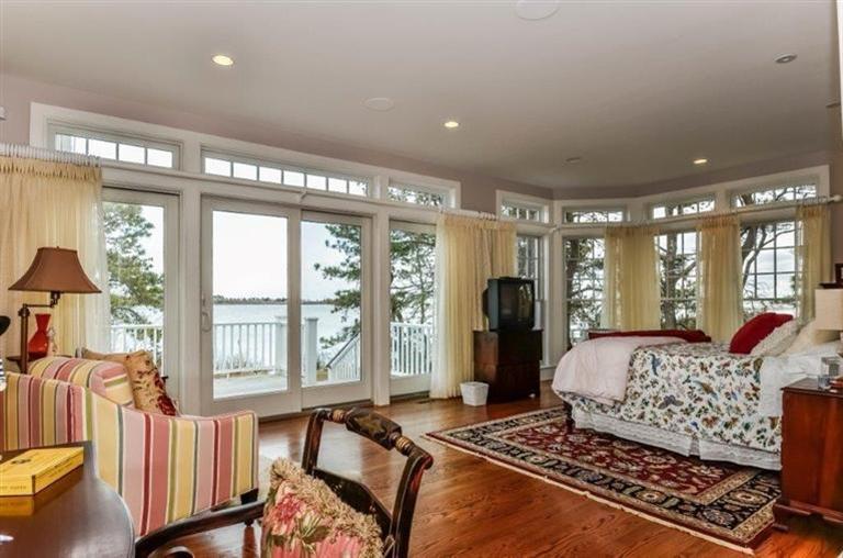 6 Yacht Club Road Falmouth, MA 02536 - Photo 18 of 35 a bedroom with furniture and a large window