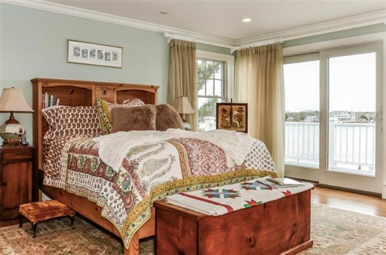 6 Yacht Club Road Falmouth, MA 02536 - Photo 21 of 35 a bedroom with a bed and a window