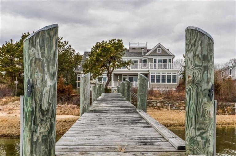 6 Yacht Club Road Falmouth, MA 02536 - Photo 27 of 35 a view of a house with many windows