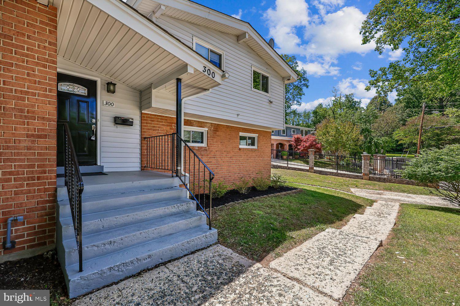 300 Gilsan Court Silver Spring, MD 20902 - Photo 11 of 117 a view of a house with a yard