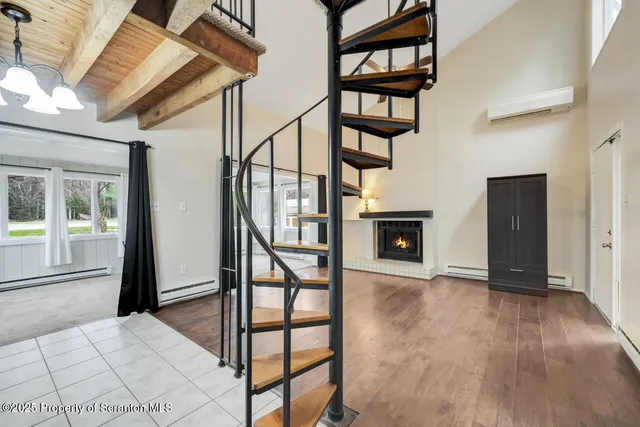 a kitchen with cabinets and stainless steel appliances