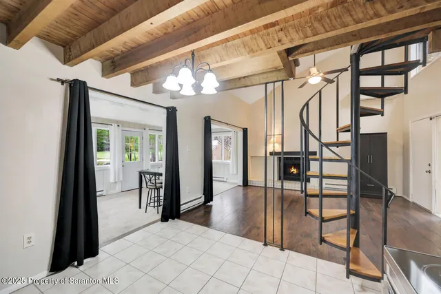 a kitchen with stainless steel appliances a refrigerator sink and cabinets