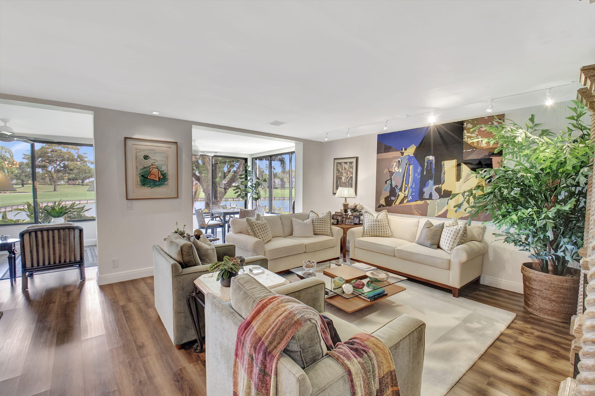 27 Eastgate Drive, Unit C Boynton Beach, FL 33436 - Photo 17 of 87 a living room with furniture and a large window