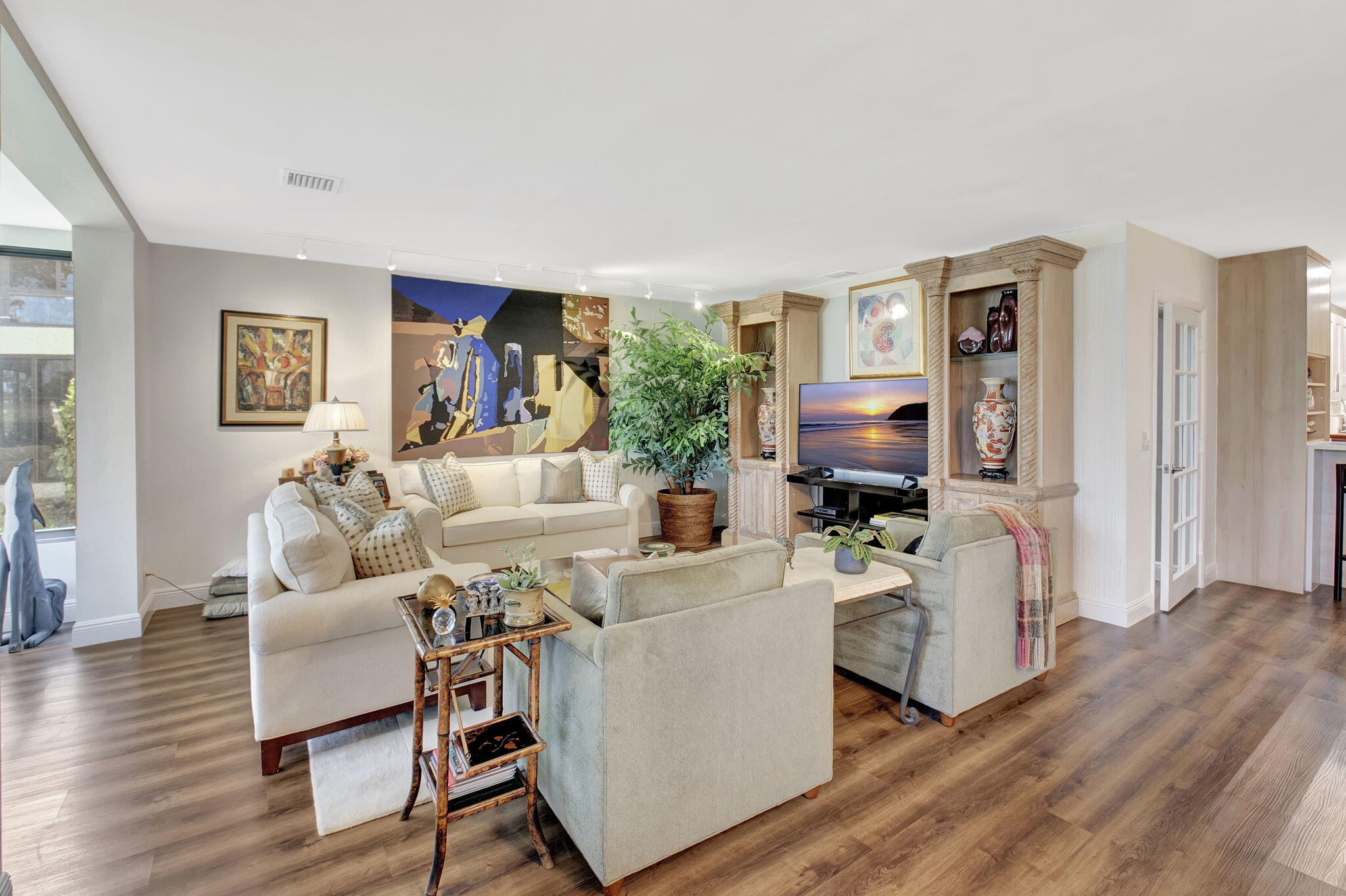 27 Eastgate Drive, Unit C Boynton Beach, FL 33436 - Photo 18 of 87 a living room with furniture and a wooden floor