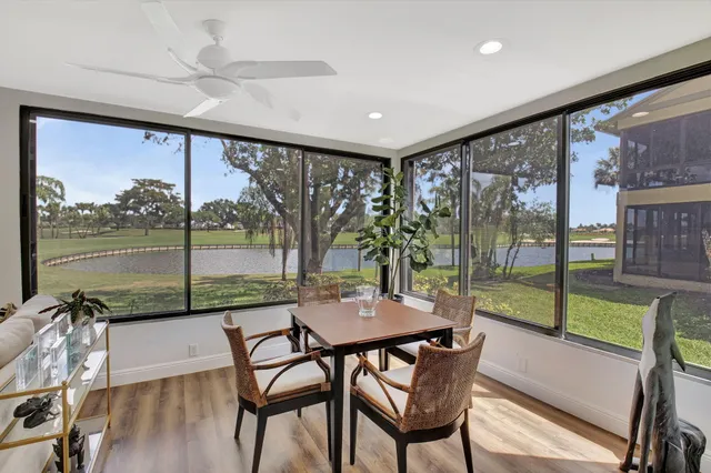 a bedroom with furniture and a flat screen tv
