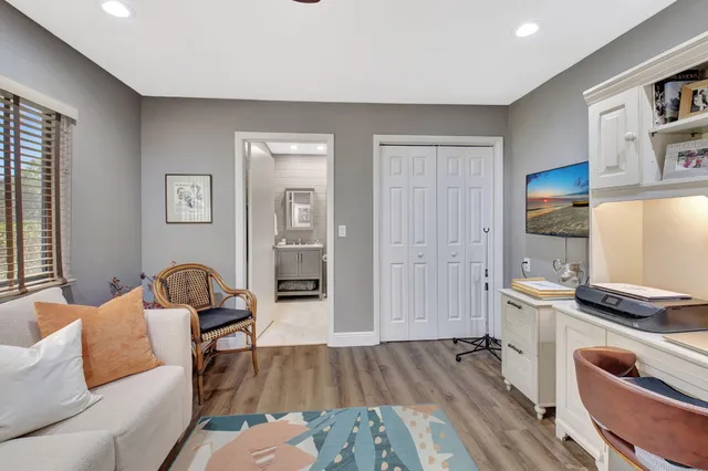 a view of a park with palm trees